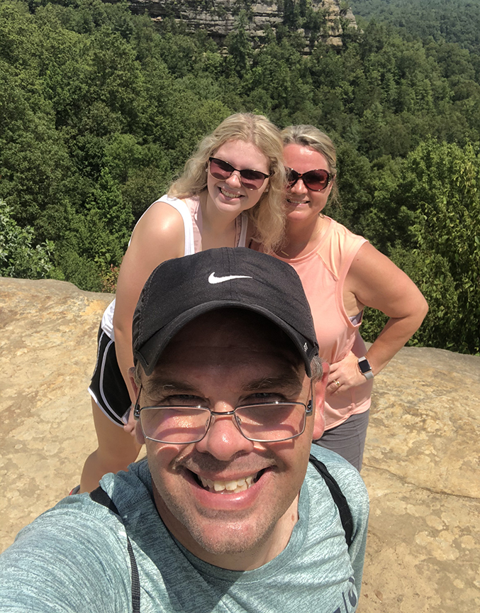 Jay Stancil hiking with family
